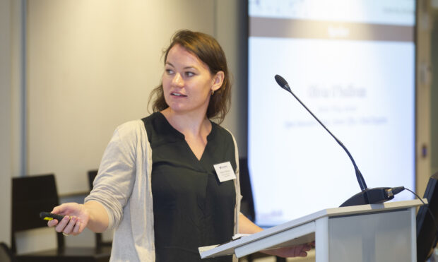 Olivia O'Sullivan, the author of the blog, giving a presentation in The Hague.